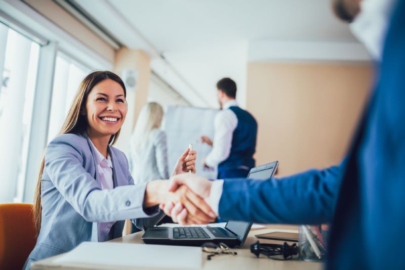 real estate agent shaking hands