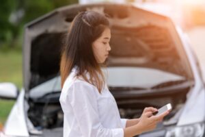 woman on the phone after a car accident